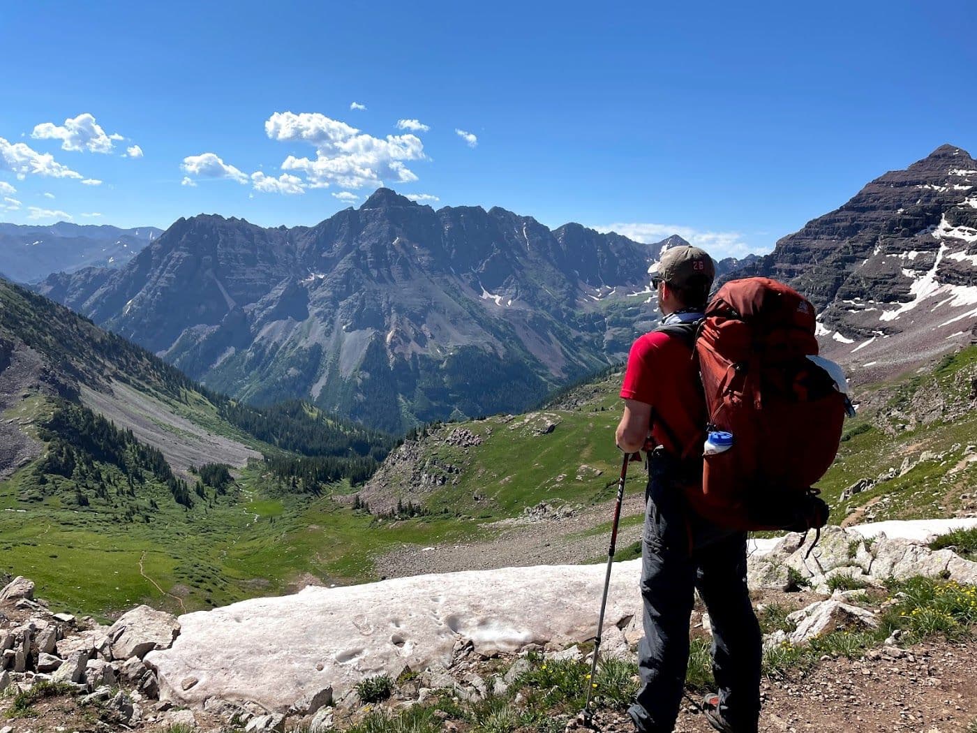 Bill Fournet looking across a dramatic high-country mountain vista
